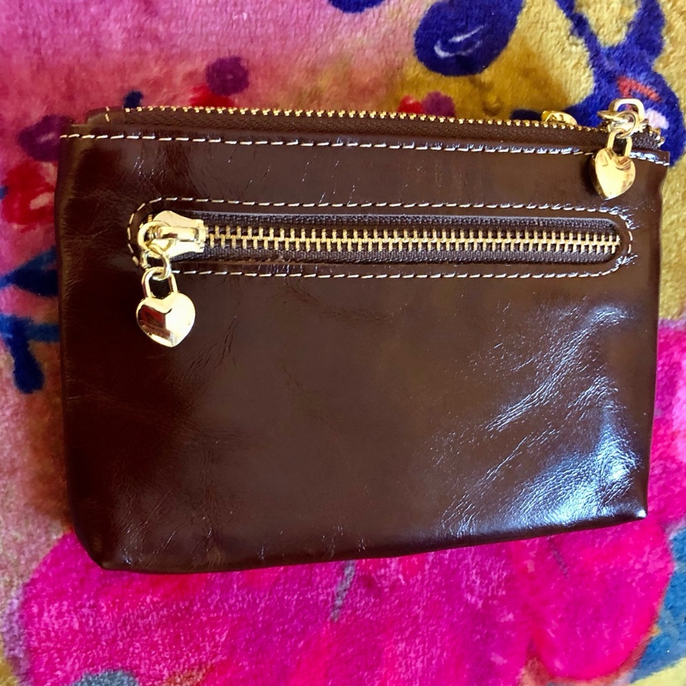 LIMOGES small coin purse. Looks new but the key ring is missing and a flaw